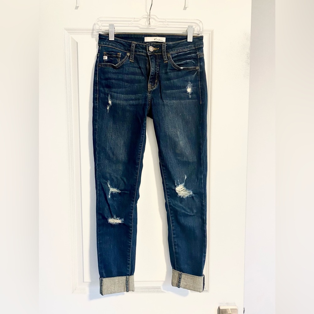 Boot cut lightly distressed dark wash KanCan jeans. Women’s 24; fit like a 25